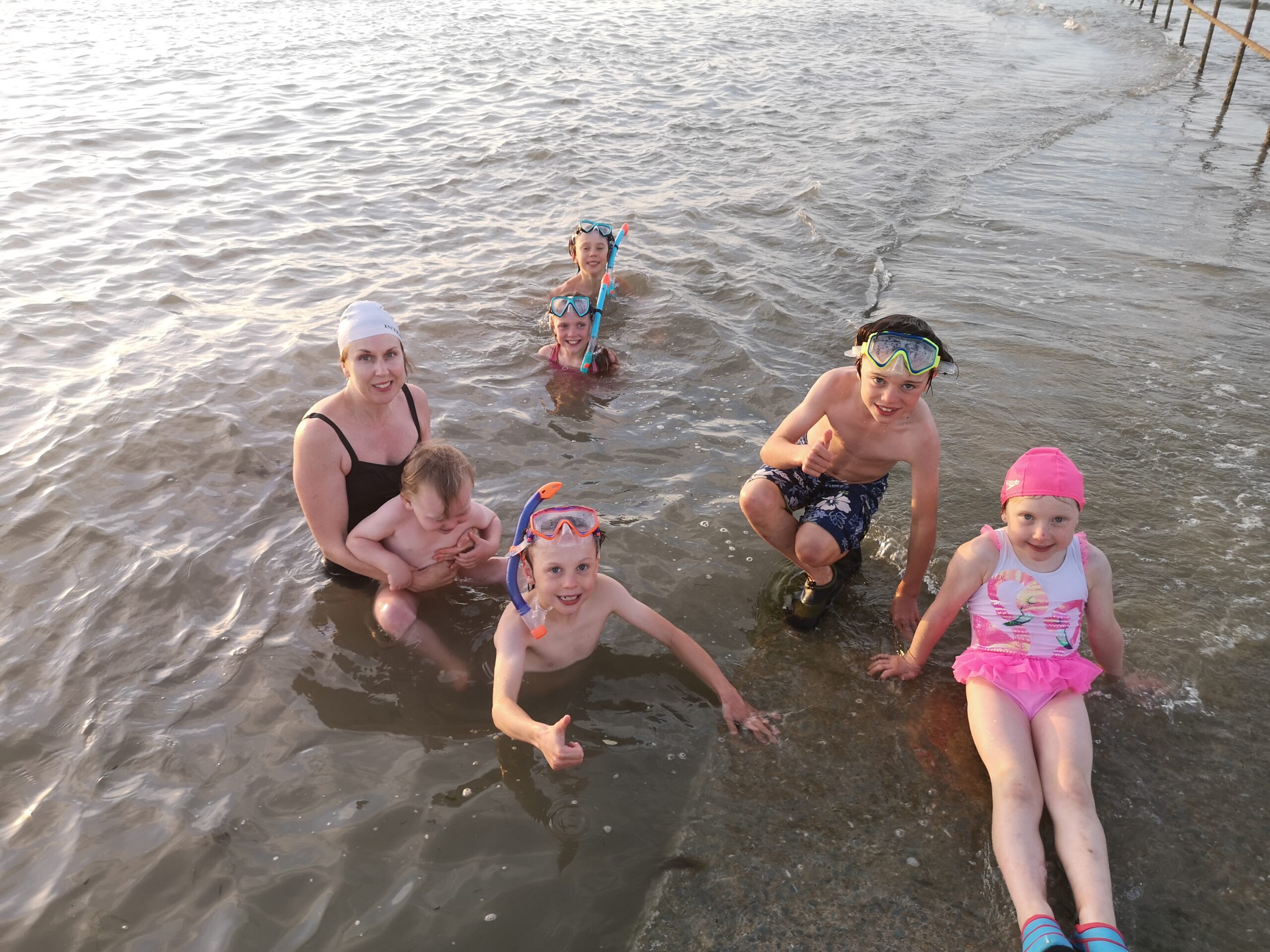 L to R Caoimhe, Farron, Iseult, Lochlann Rian, Orhran and Ailbhe McArdle Salterstown Pier Caoimhe and the kids in the water at Salterstown.