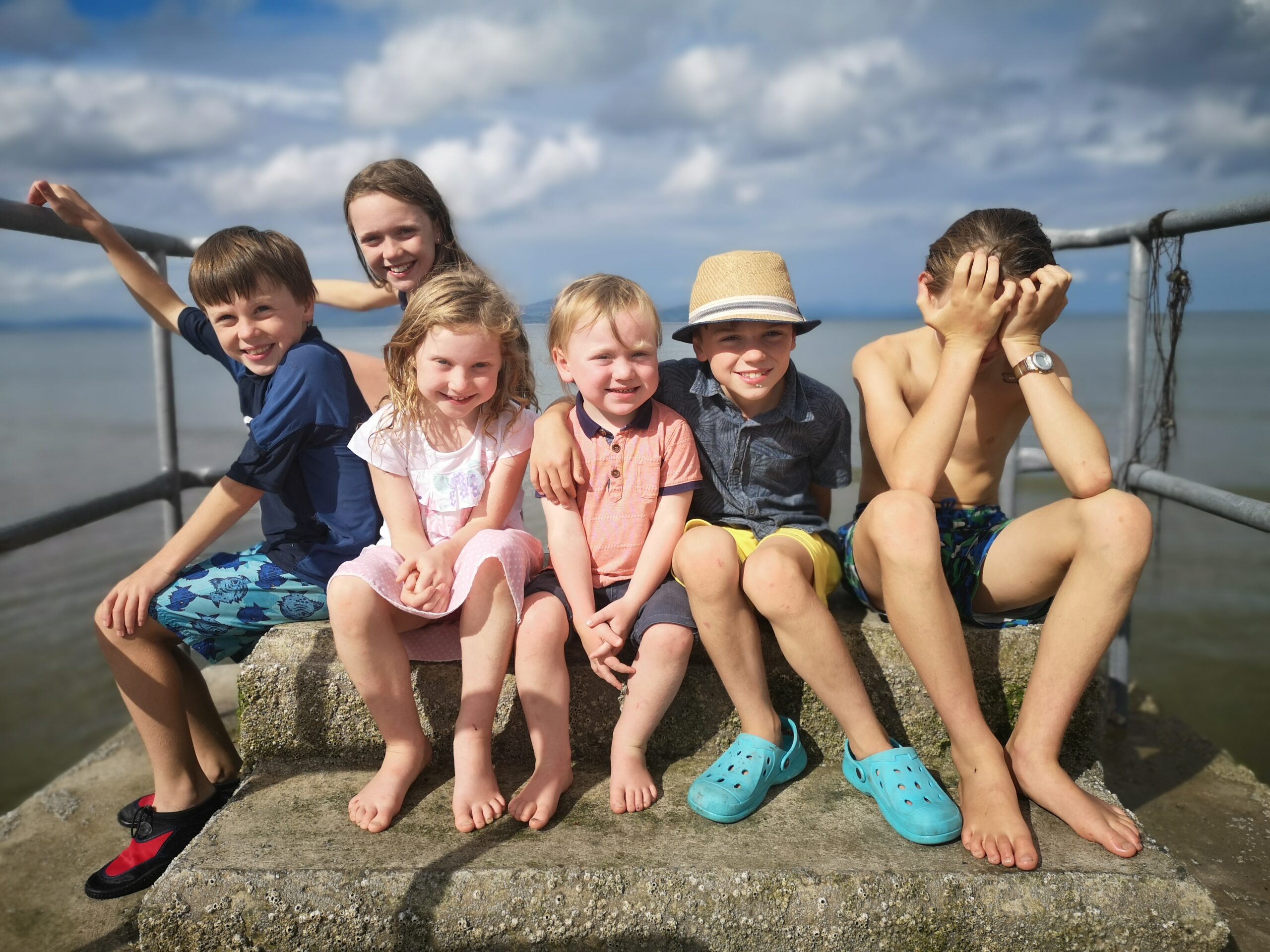 L to R Rian, Iseult, Ailbhe, Farron, Odhran and Lochlann McArdle post swim at Salterstown Our six kids, post swim at Salterstown Pier.